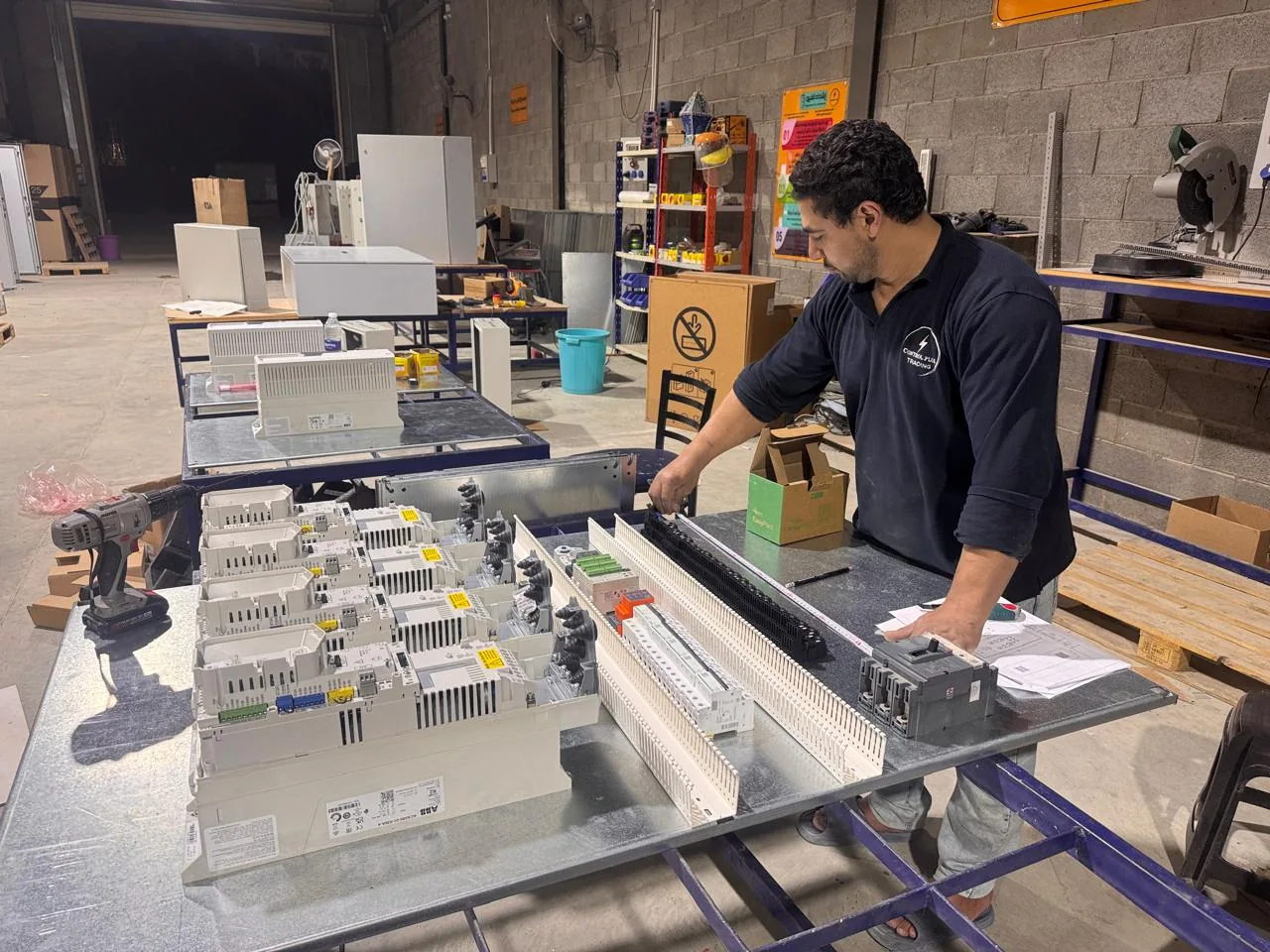 Engineer assembling an electrical panel